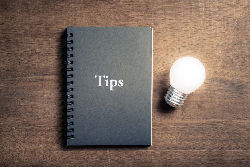 tips book and light bulb